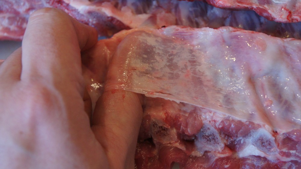 Remove membrane of ribs