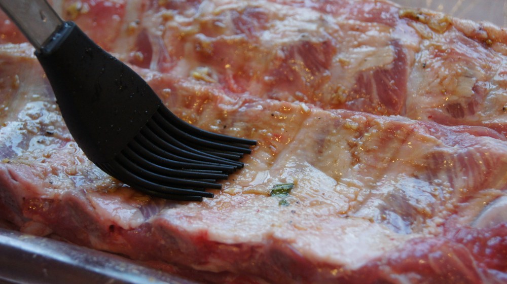 Basting BBQ ribs